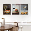 A set of three gallery-style prints featuring food and drink, including a glass of wine, a burger, and a cocktail.