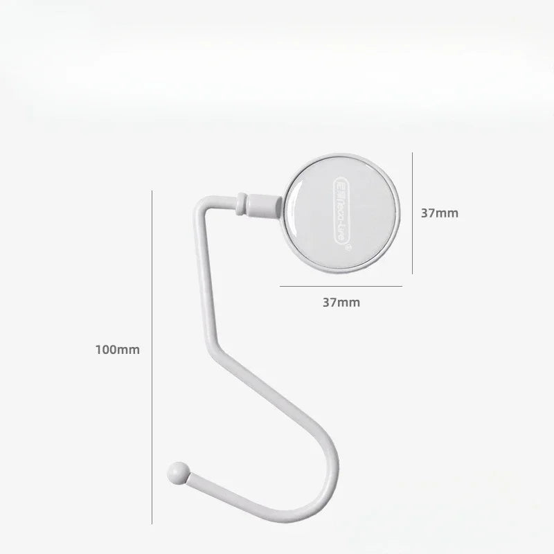 A white heavy duty purse and bag hook with a circular clip for organization.