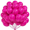 A cluster of bright pink latex balloons tied together, ready for a celebration.