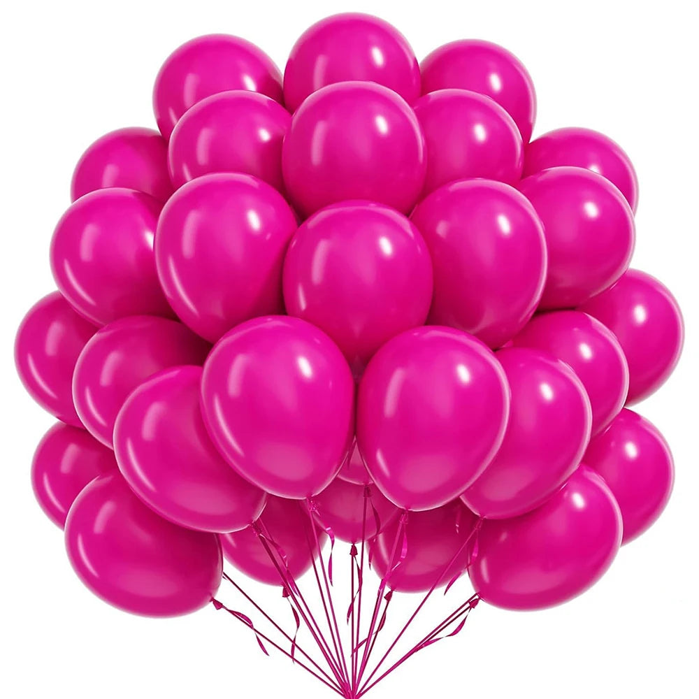 A cluster of bright pink latex balloons tied together, ready for a celebration.