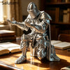 A silver 3D printed medieval knight figurine standing on a wooden surface.