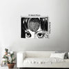 Black and white illustration of a woman's face with swirling lines, framed by dimensions.