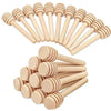 A set of ten natural wood honey dipper sticks arranged in a fan shape.
