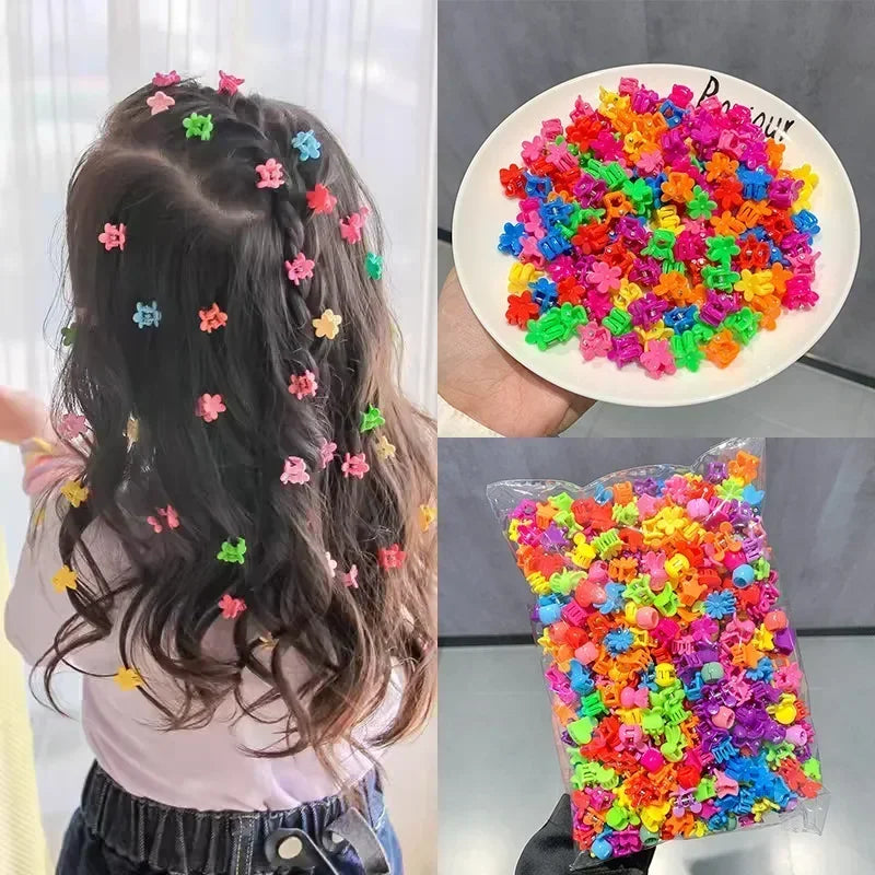 A colorful assortment of flower and star hair claw clips for kids displayed on a plate and in a clear container.