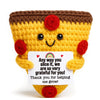 Handcrafted crochet animal doll in yellow and brown yarn with a message card attached