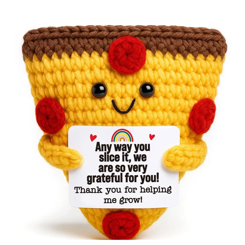 Handcrafted crochet animal doll in yellow and brown yarn with a message card attached