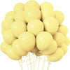 A bunch of pale yellow latex balloons tied together for a party or event decoration.