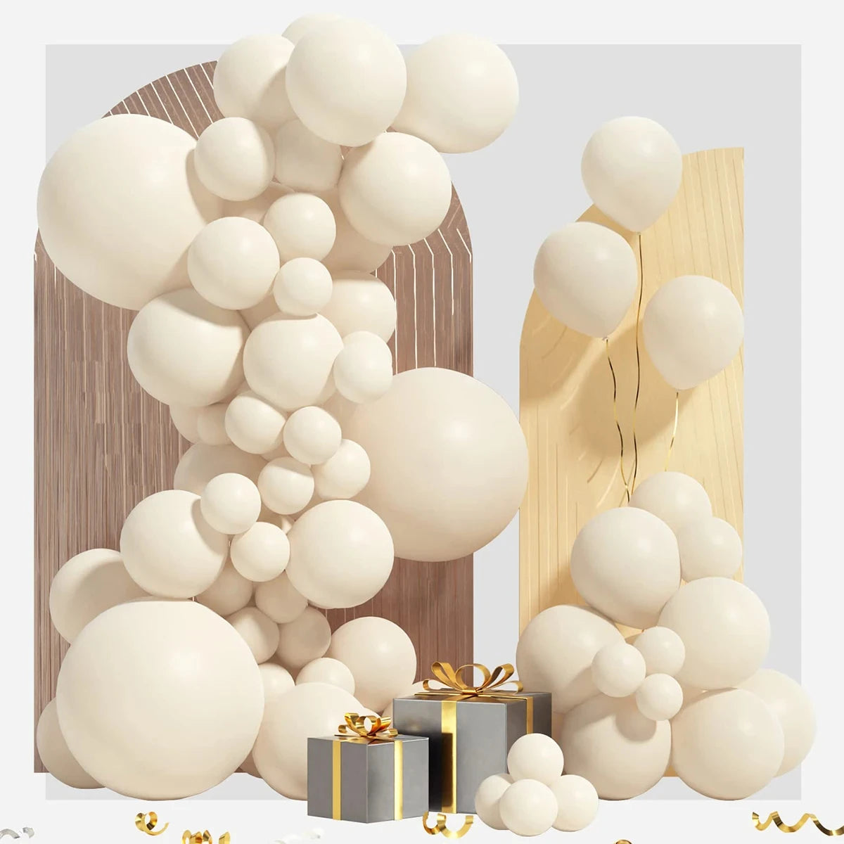 A display of white and beige latex balloons arranged in a garland arch with wrapped gifts.