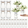 Clear faceted diamond crystal plastic vase with twine decoration and floral arrangement