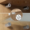 Close-up view of heavy-duty steel shelf pins with self-tapping screws used for floating shelves.