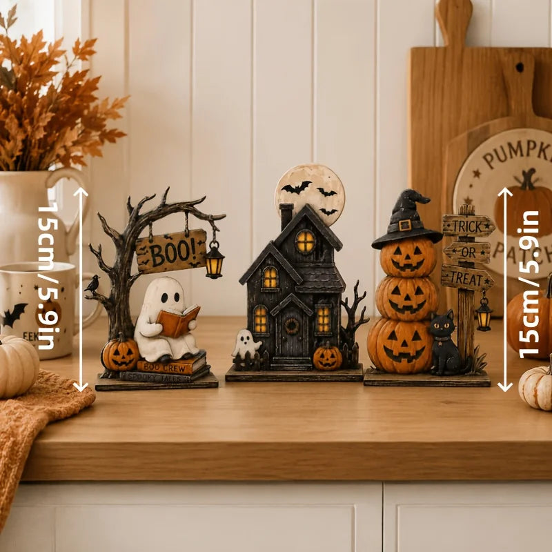 A set of vintage Halloween wooden block decor featuring a spooky house, pumpkin figures, and a witch silhouette.