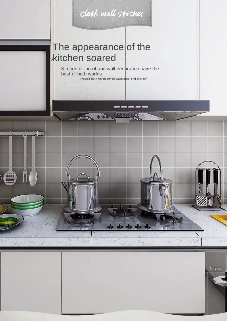 A kitchen display featuring a wall sticker promoting oil-proof and waterproof kitchen decor.