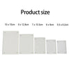 A row of white acrylic magnetic photo frames showing various sizes and dimensions.