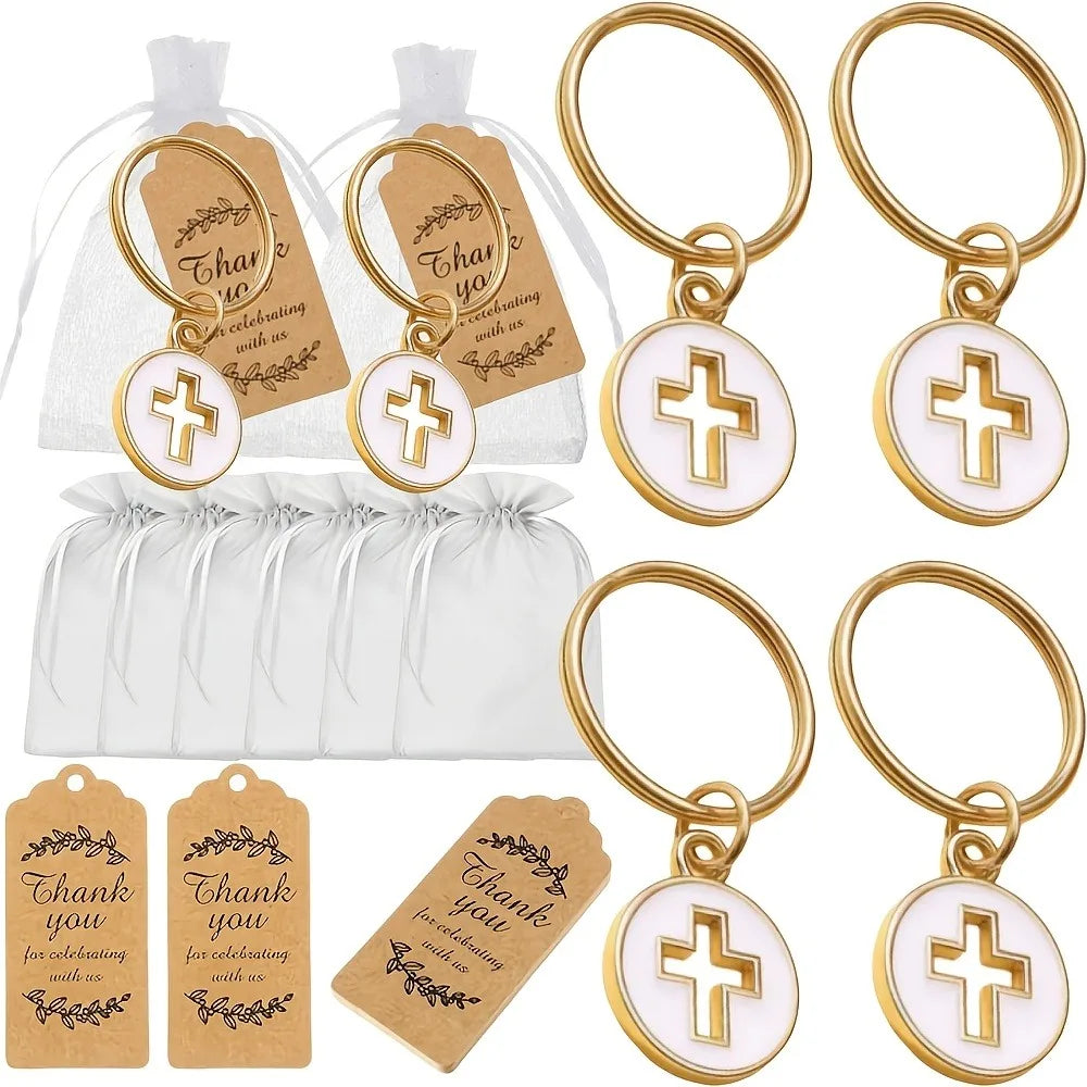 Gold cross keychains with thank you cards and organza bags for baptism party favors