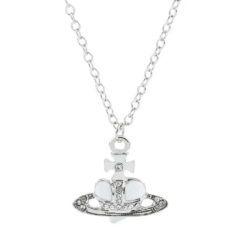 Silver pendant necklace featuring a vintage diamond-inlaid Saturn design.