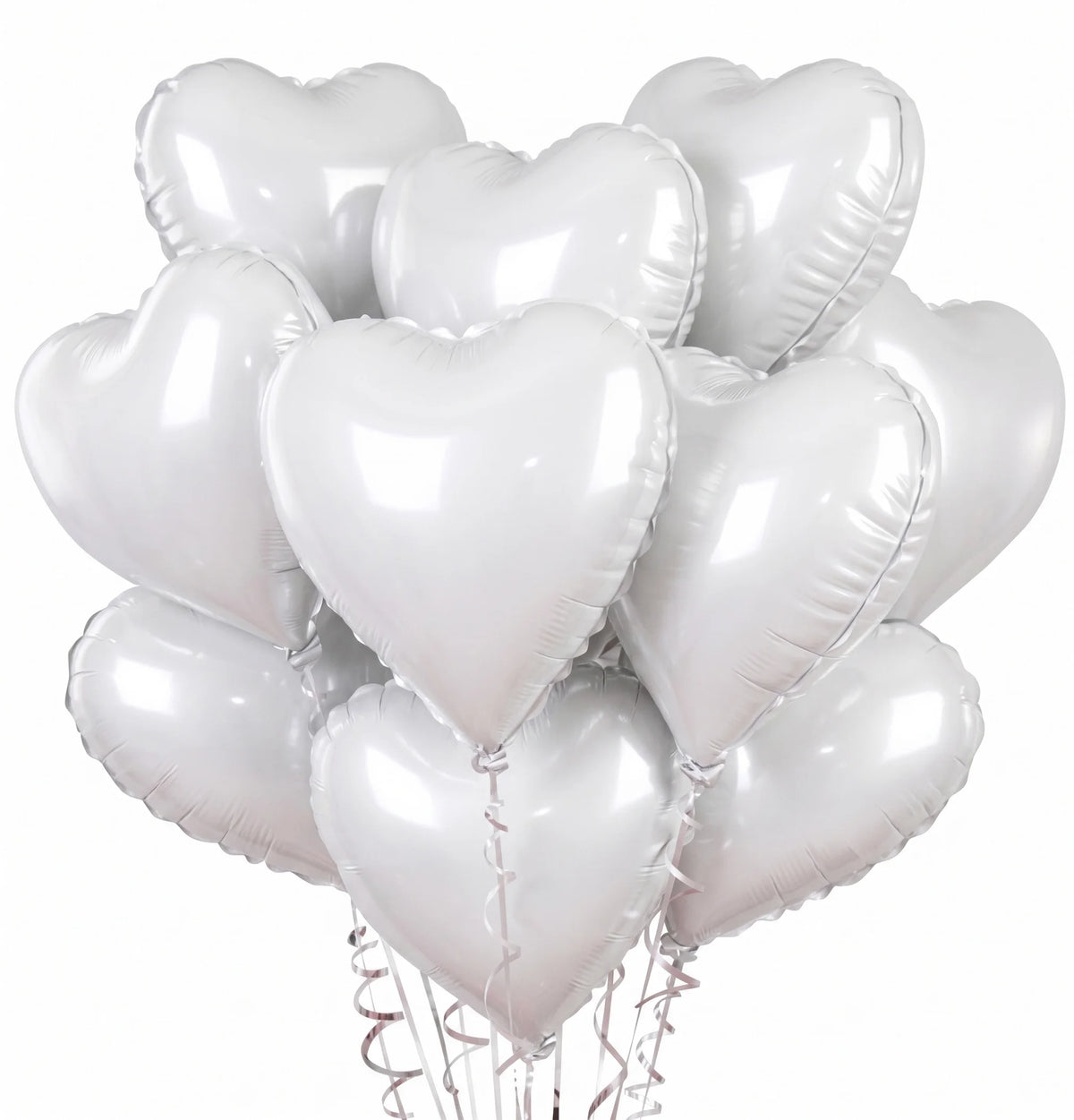 A bunch of white heart-shaped foil balloons tied together on a string.