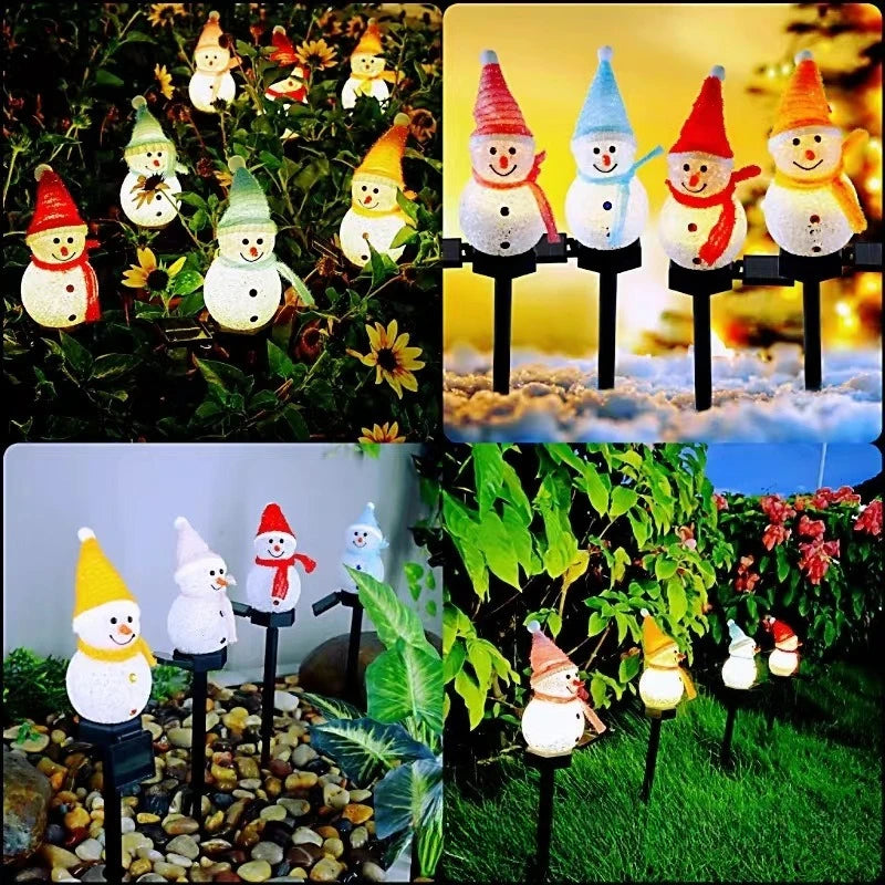 A collection of solar powered outdoor Christmas snowman lights in various colors and sizes displayed in a garden setting.