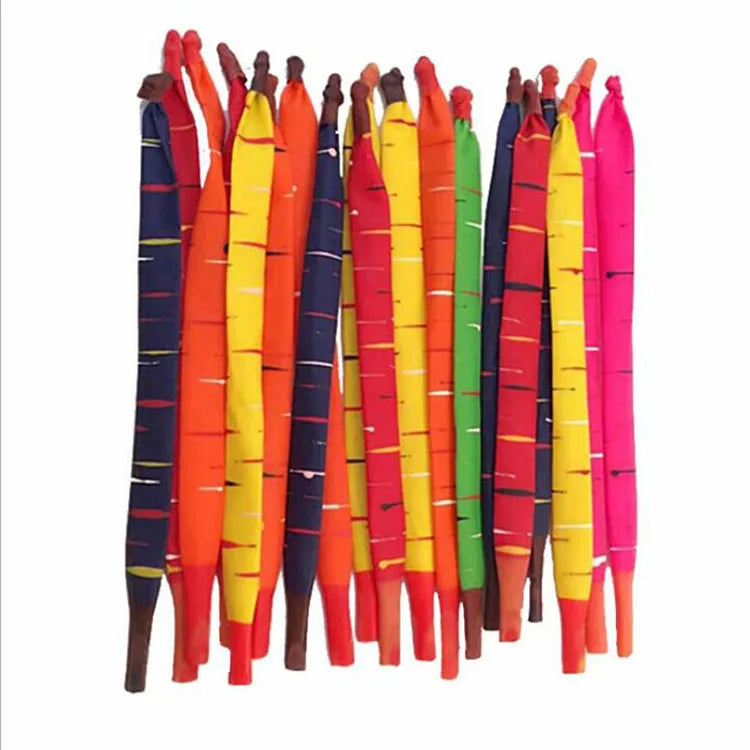 A collection of latex rocket balloons in various bright colors including orange, yellow, pink, and blue.