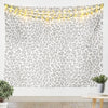 Leopard print tapestry wall hanging featuring a wild animal pattern on a white background.