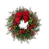 Artificial pine and eucalyptus wreath decorated with red berries and a red bow