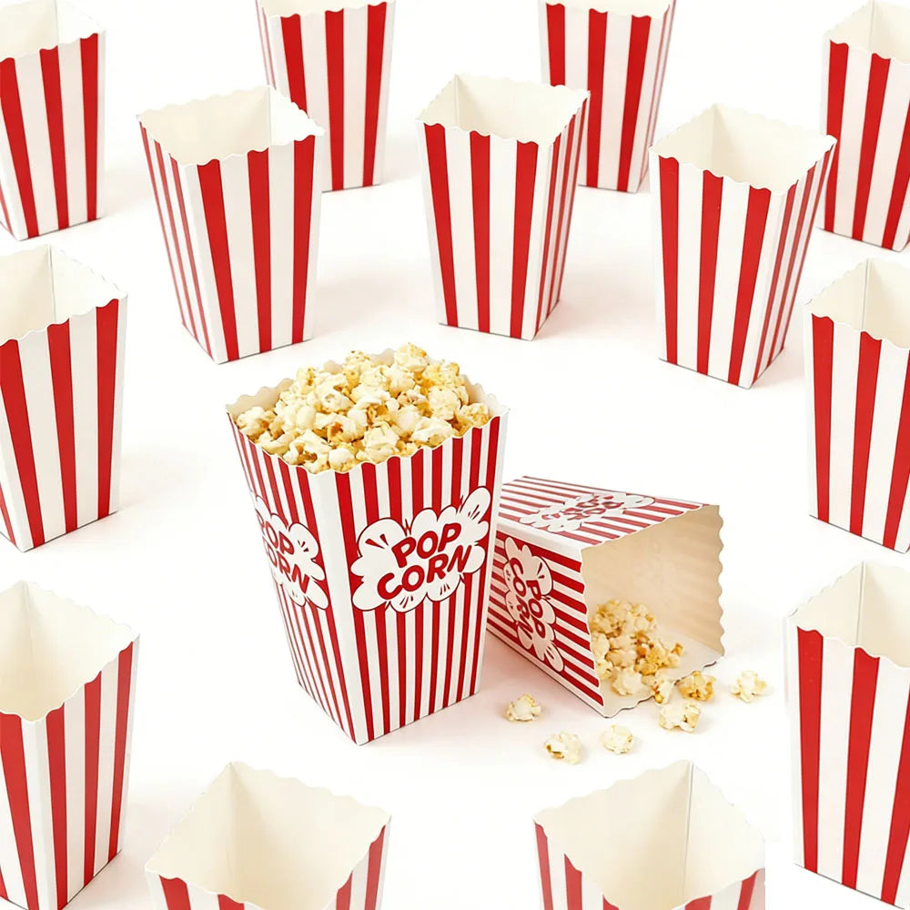 Red and white striped paper boxes filled with popcorn and snacks