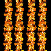 A close-up of an orange and yellow LED string lights garland with leaf-shaped bulbs.