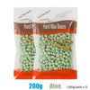A package of Hard Wax Beans for beauty and hair removal, showing green beans inside.