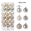 A box containing 36 festive Christmas tree ornament balls in various silver and champagne finishes.