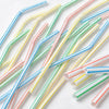 Assorted flexible reusable drinking straws in various colors like blue, green, yellow, and red.