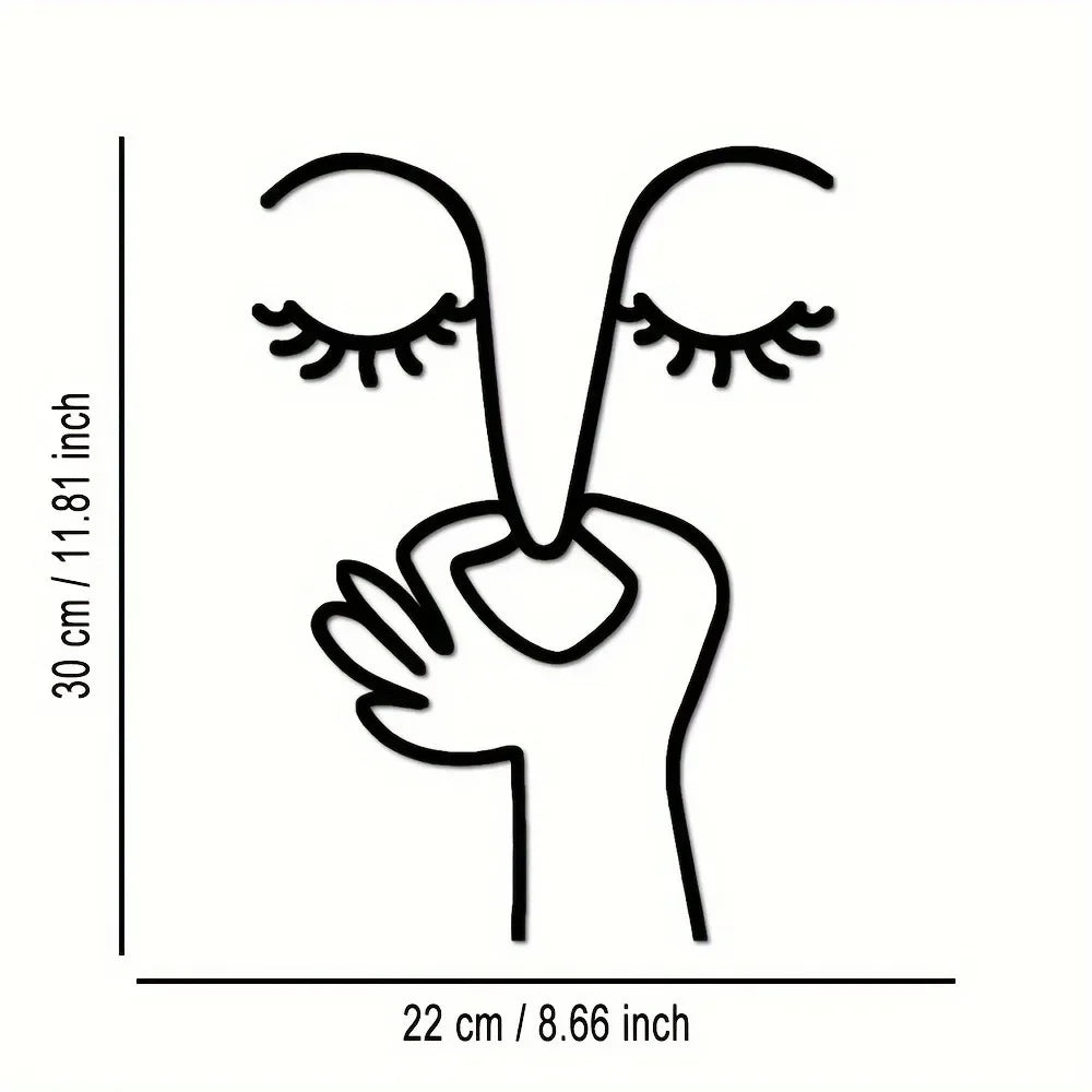 Line art drawing of a face and hand outline on a white background.
