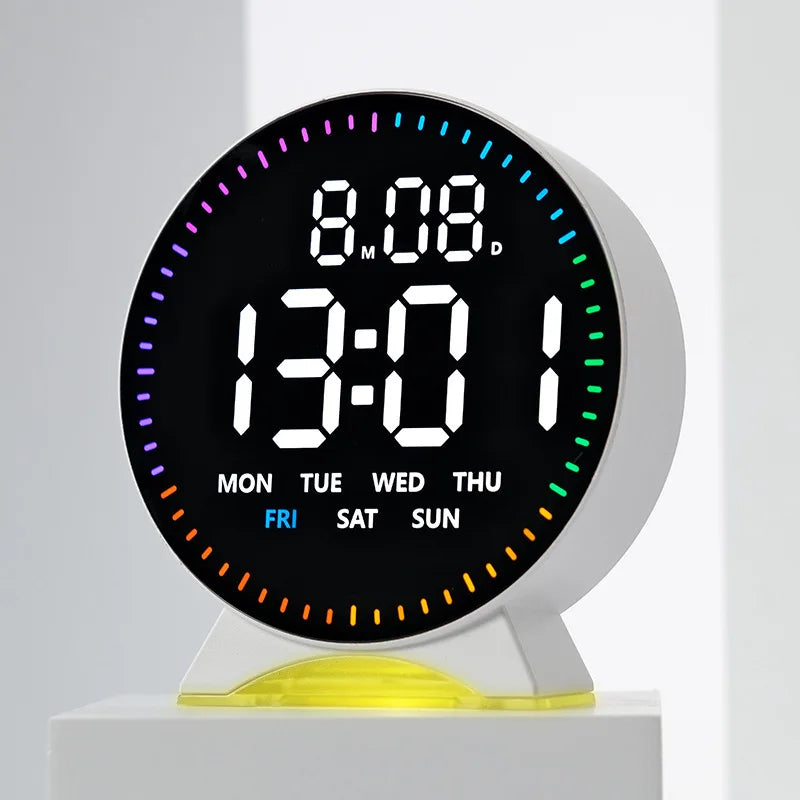 A round digital alarm clock displaying 8:08 and the day of the week, with a white face and yellow base.