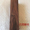 A vertical piece of dark brown wood, likely a blank for knife handles or DIY projects.