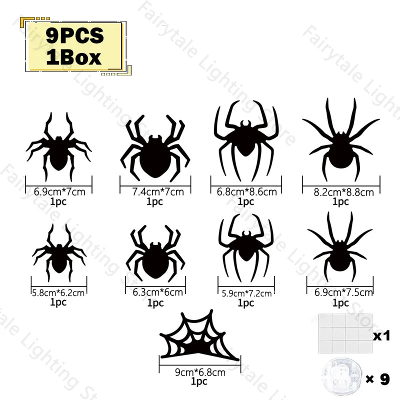 Un juego de nueve piezas decorativas de luces nocturnas en forma de murciélago y araña, empaquetadas en una caja.