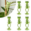 Green frog-shaped plant support clips used for climbing plants and tomatoes
