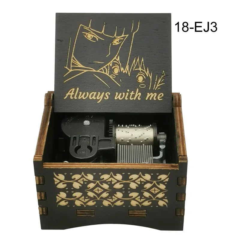 A wooden music box featuring an anime character design on the lid and decorative carving on the base.