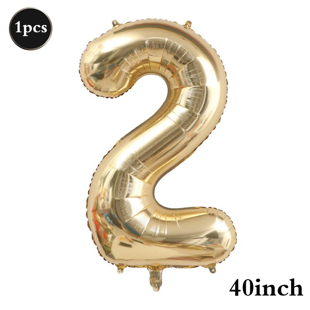 A large, gold foil number balloon shaped like the number 2, suitable for birthday and party decoration.