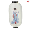 A white paper hanging lantern depicting a woman in traditional blue and red attire holding a box.