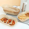 Serviettes en papier rectangulaires extra-larges pour friteuse à air, exposées sur un grille métallique noire.
