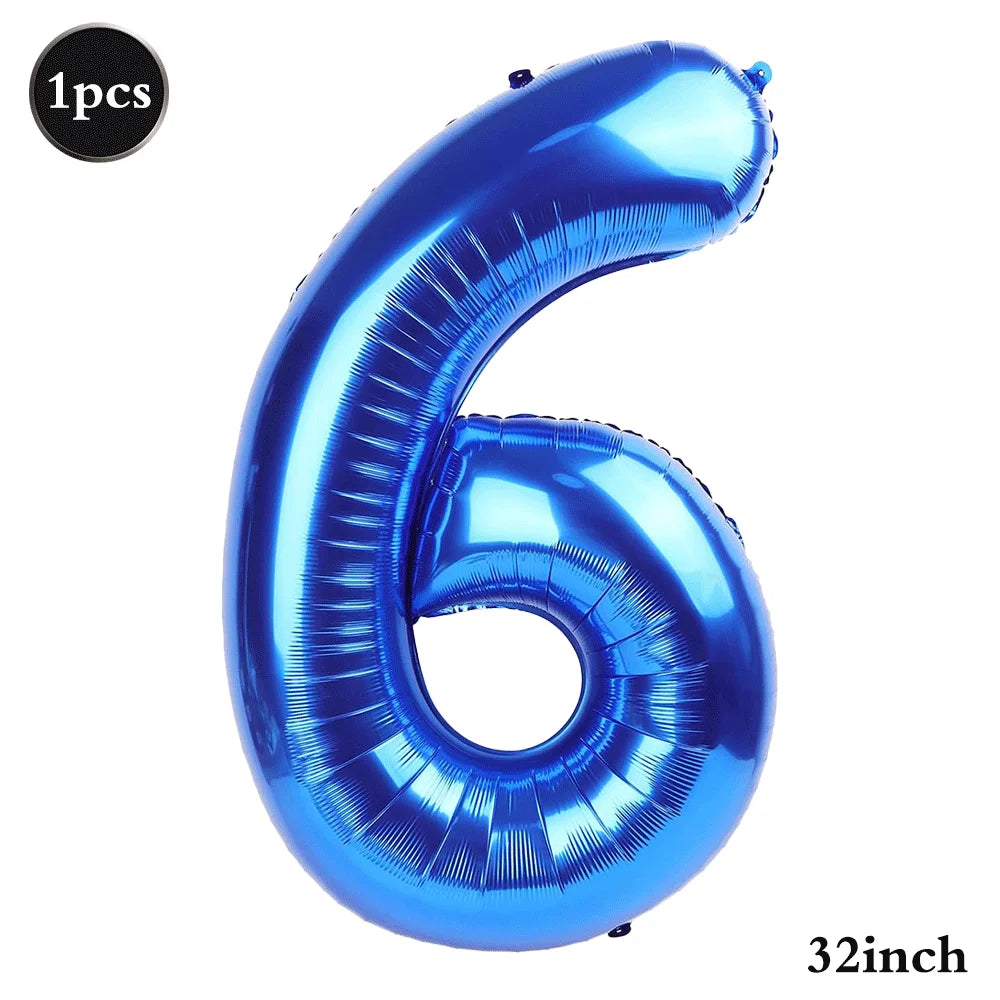 A shiny blue foil balloon shaped like the number 6, measuring 32 inches.