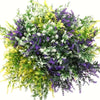 A dense bouquet of artificial lavender and green foliage with white and yellow accents for outdoor decor