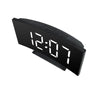 A black LED alarm clock with a digital display showing 12:07 and various function buttons.