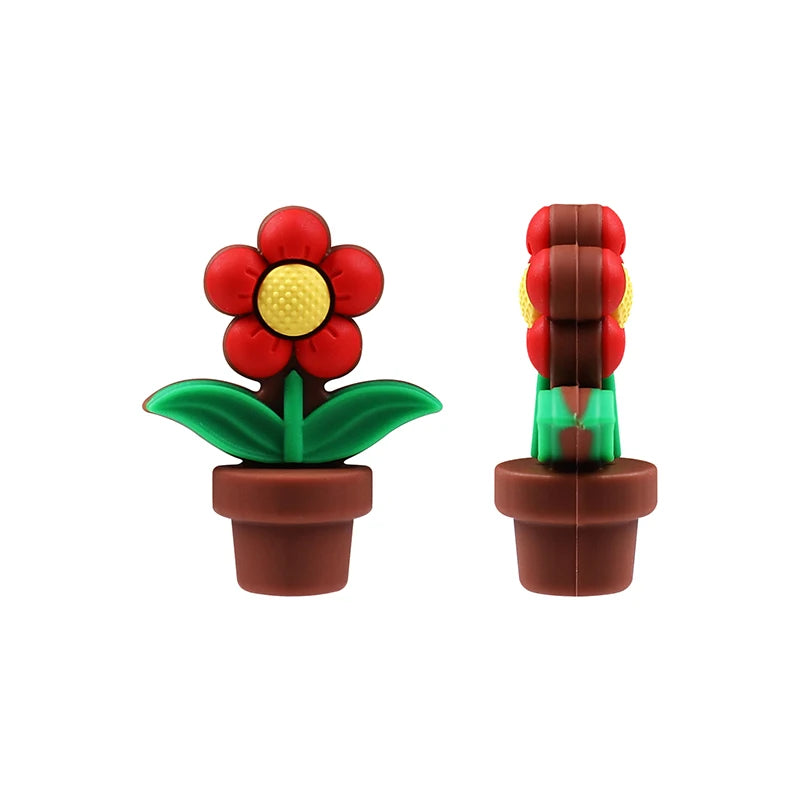 Two 3D silicone plant beads for jewelry making featuring a red flower and green leaves.