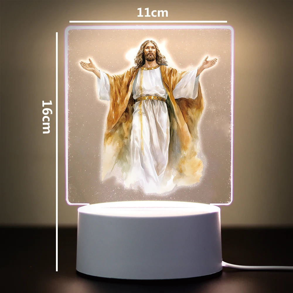 A glowing 3D LED night light depicting Jesus Christ with outstretched arms on a square panel.