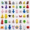 A collection of multi-animal 3D printed figurine ornaments in various colors and shapes.