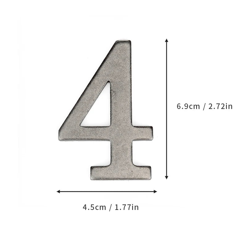 A silver magnetic house number shaped like the numeral four, with dimensions 6.9cm by 4.5cm.