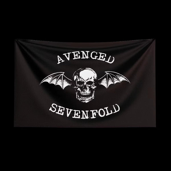 Black tapestry featuring a white skull with bat wings and the text AVENGED SEVENFOLD.
