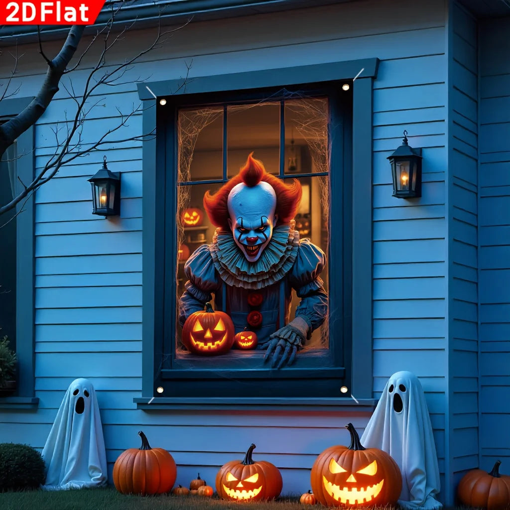 A window banner featuring a terrifying clown with an orange pumpkin and spider web design displayed on a house facade.