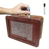 A wooden savings box with a progress tracker is being held by a hand, showing various savings amounts.