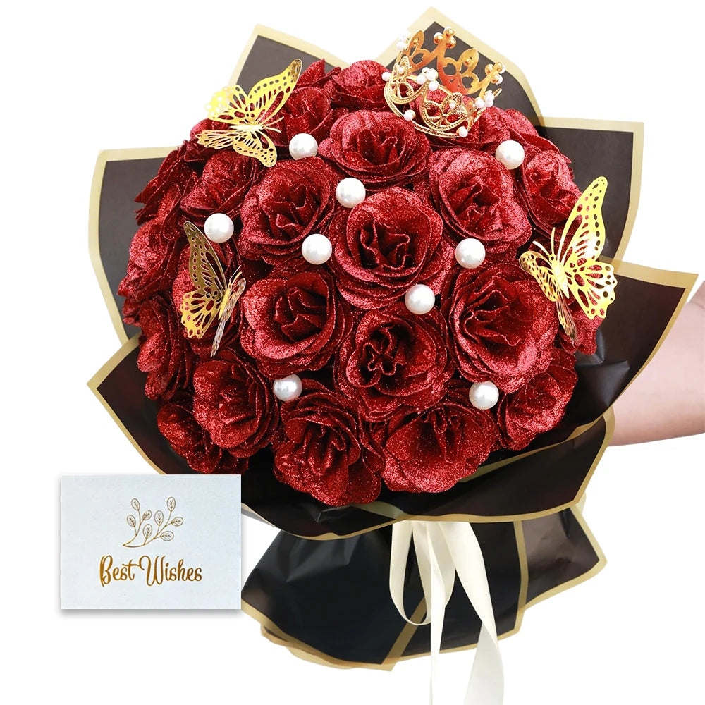 A bouquet of deep red glitter roses with gold accents and pearl details presented in a dark brown paper wrapper.
