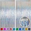 Metallic foil tinsel fringe backdrop set with various iridescent and colored strands.